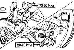 Расположение и моменты затягивания болтов (1) крепления кронштейна амортизационной стойки к поворотному кулаку и болта (2) крепления пальца шарового шарнира нижнего рычага