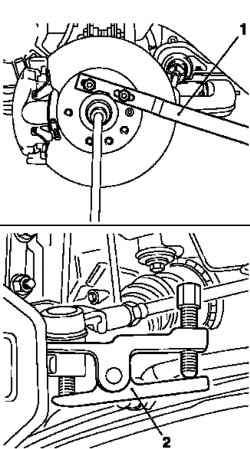 Отсоединение рулевой тяги от поворотного кулака
