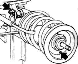 3.16 Правильное положение установки верхнего седла пружины передней подвески по отношению к поворотной цапфе (указано стрелками)