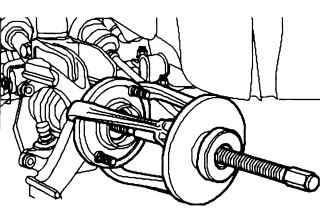 Снятие поворотного кулака с привода колес с помощью съемника