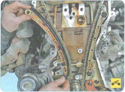 Снимите башмак натяжителя цепи - Mazda CX-7 замена цепи привода ГРМ